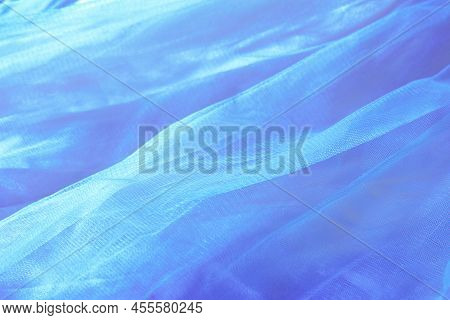 Beautiful Nude Blue Tulle With Shiny Beads Background. Draped Background Of Pink Powdery Fabric, Tex