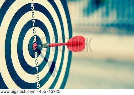 The Bullseye, Or Bull's-eye Or Dart Board Has Dart Arrow Hitting The Center Of A Shooting Target For