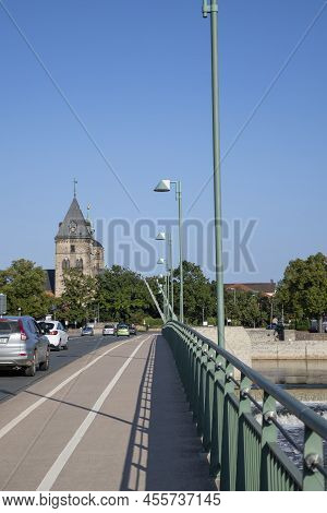 Hameln, Lower Saxony, Germany, 09 04 2021, View On Church Tower From A Bridge, Cars On The Street