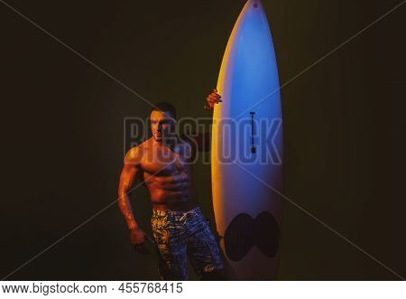 Surfboard Sexy Man. Guy With Serf Board. Summer Vacation Concept. Surfer With A Surfboard. Portrait 