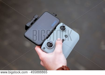 Remote Control Of The Quadcopter. The Operator Controls The Drone. The Phone On The Remote Control.