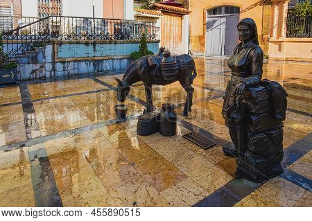 Oviedo, Uvieu, April 3, 2022. The Milk Sellers In The Plaza De Trascorrales In Oviedo. Work Of Manue