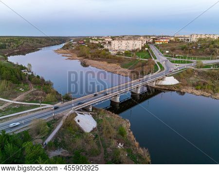 Beautiful View Of The Bridge Across The Iset River In The City Of Kamensk-uralsky At Sunset In Sprin