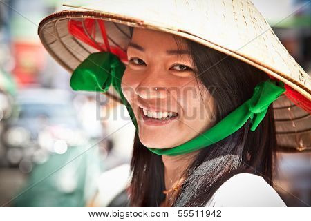 HO CHI MINH, VIETNAM-NOVEMBER 17. 2013: Street food vendor in the street of Ho Chi Minh on Noveber 17, 2013, Vietnam. Estimate 10.6% of Vietnam's population is below the poverty line.