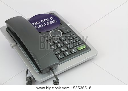 No cold callers sticker on a telephone set