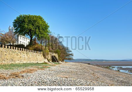 Aldingham shoreline with a white house