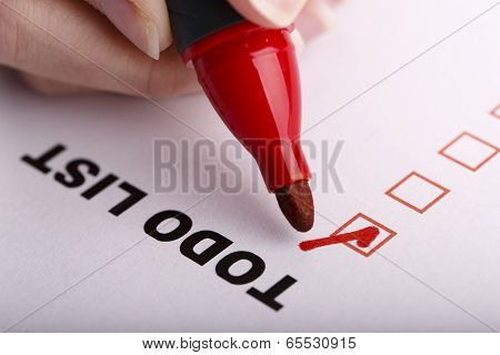To Do List With Woman Hand And Marker