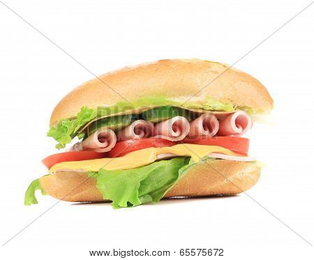 Sandwich with bacon and vegetables.