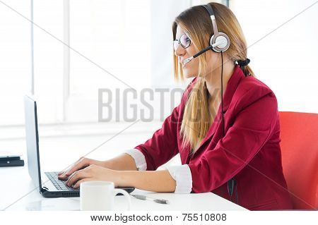 Young Business Girl Using Her Computer.