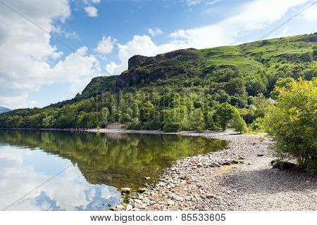 Barrow Bay Derwent Water on calm still summer morning in the English lake District