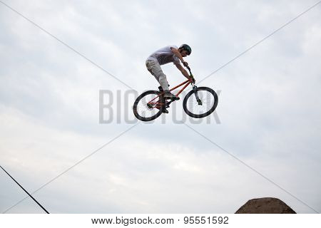 BONTIDA, ROMANIA - JUNE 27, 2015: Unidentified BMX rider making a bike jump during the BMX Competition, at Electric Castle Festival.