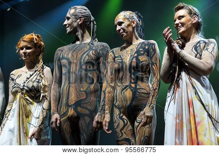 KRAKOW POLAND - JUNE 20 2014: The night of the Music on Szczepanski Square in Cracow. Slavic Prelude perfomed by WATAHA Slavic Drummers and Art Color Ballet shows to the modern viewer colorfull archetype of the Slavic world full of magic