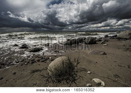 stormy beach windy waves clouds sea sand