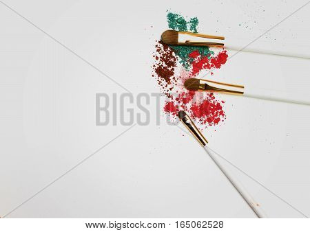 Makeup highlighter, make-up on Valentine's Day, shadow and brushes for make-up, make-up artist for the tools.