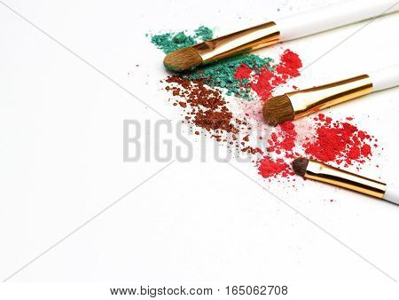 Makeup highlighter, make-up on Valentine's Day, shadow and brushes for make-up, make-up artist for the tools.