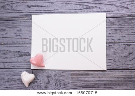 Valentine's day background. Vanlentine's day concept. Two hearts on the gray wooden background