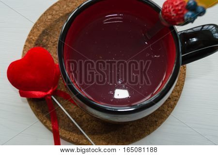 kissel in mug with red velvet heart
