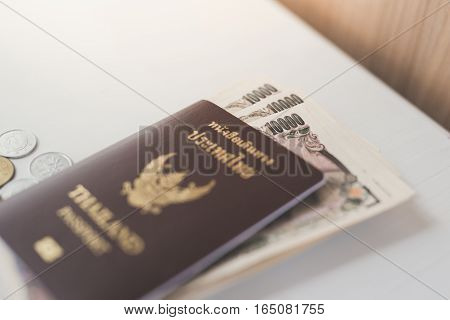 Close up of Passport and currency background