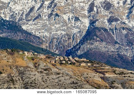 Winter view of Village of Sauze du Lac on plateau with Grand Morgon mountain in the background. Hautes-Alpes French Alps France
