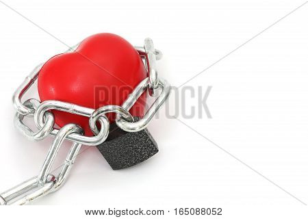 Isolated Red Sponge Heart Locked By Key Chain On White