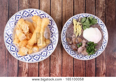 Red Brown Rice , Porridge With Mined Pork And Chicken Lever .