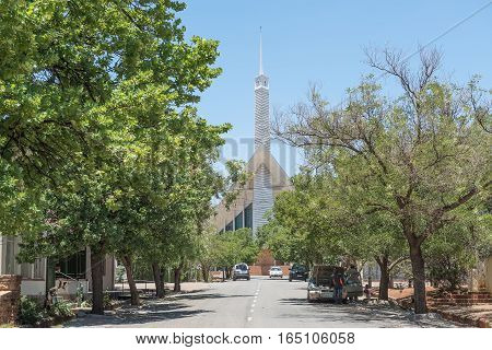 FAURESMITH SOUTH AFRICA - DECEMBER 31 2016: A street scene in Fauresmith with the Dutch Reformed Church at the end