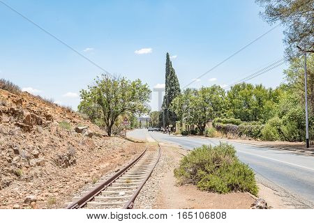 FAURESMITH SOUTH AFRICA - DECEMBER 31 2016: A street scene in Fauresmith one of only three towns on earth where the railway line runs down the centre of the main road