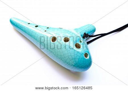 The blue ocarina Ocarina isolated on white background