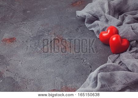 Valentines day concept with heart shapes over dark background
