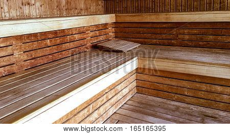 relax and get away conceptual health and wellness photo of classic wood sauna room interior