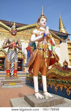 Statue Standing Outside Wat Chayamangkalaram Located In Penang