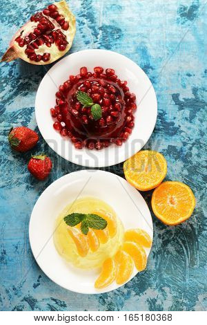 berry fruit jelly with fresh fruits - summer dessert
