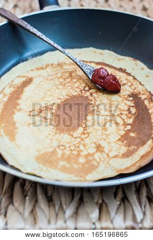 Stack of pancakes on a frying pan. Top view. Flat lay