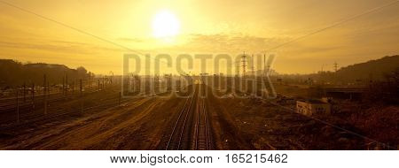 Post-apocalyptic industrial landscape against the background of the yellow sky