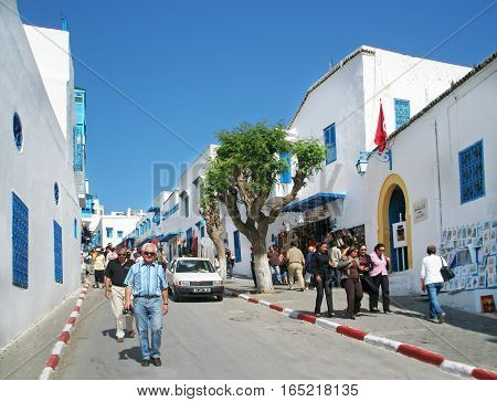 Sidi Bou Said, Tunisia - September 13, 2008: The blue and white village of Sidi Bou Said has long been a bohemian sanctuary- and its beauty now attracts wealthy Tunisians and inquisitive tourists alike