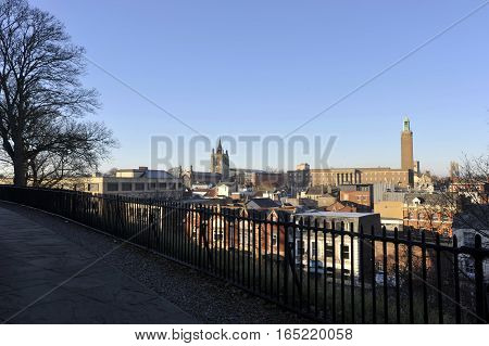 The city of Norwich Norfolk UK view from Norwich Castle with a skyline which includes City Hall and the church of St Peter Mancroft.