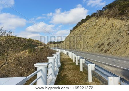 Road with bumpers on the of the years. Russia Krasnodar Krai village of Big Utrish