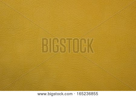 Yellow leather structured texture. design background orfey