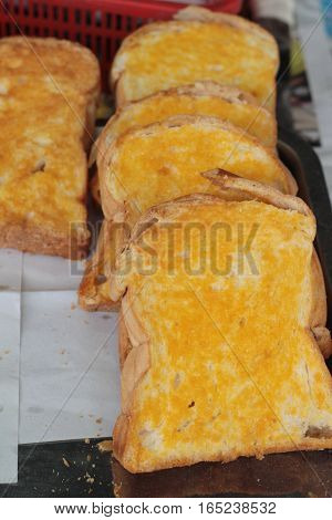 Bread toast with butter and sugar delicious