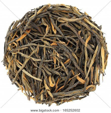 Yunnan wild arbor chinese black tea in round shape isolated closeup