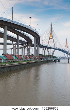 Rama9 Twin suspension bridge connect to highway intersection and bule sky background Bangkok Thailand