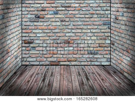 Brick Wall with wooden floor inside close