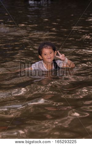 asia girl in river , thai children