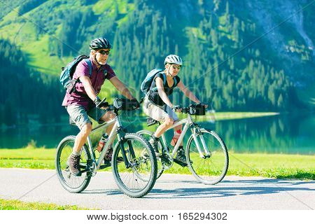 cycling seniors, by the vilsalpsee in austria