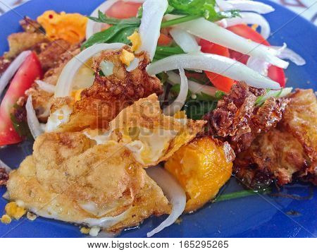 Spicy salad with fried eggs, Thai Spicy Food, Thai Cuisine, Healthy Thai Food