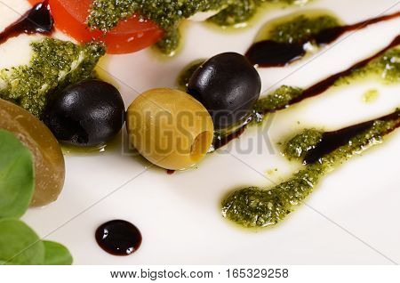 Tomatoes And Mozzarella Cheese Sliced Olives
