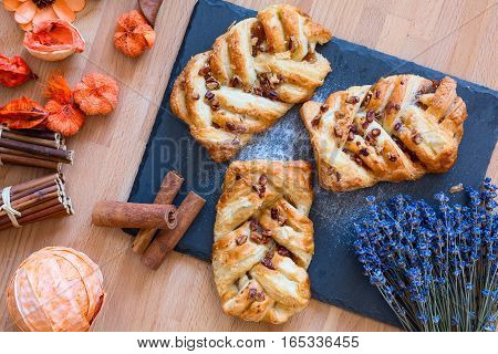 marple and pecan plait pastry sweet food breakfast with cinnamon and lavender flower