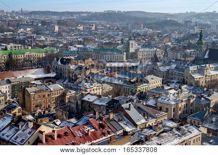 Winter panorama - landscape of old town Lvov in Ukraine in sunny day from high tower