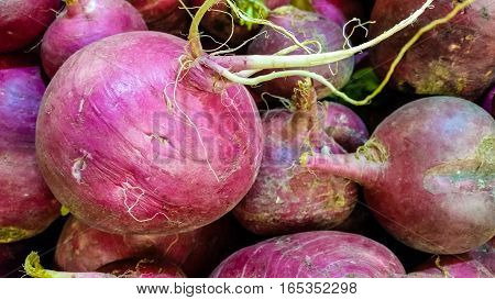 Group Of Fresh Organic Turnips In A Marketplace