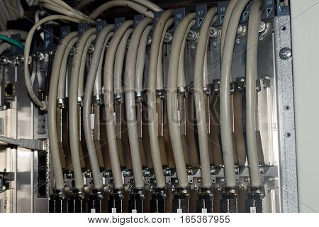 a plurality of optical cables at the optical frame in the data center